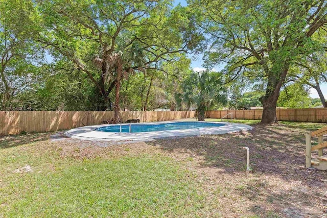 view of yard featuring a fenced backyard and a fenced in pool