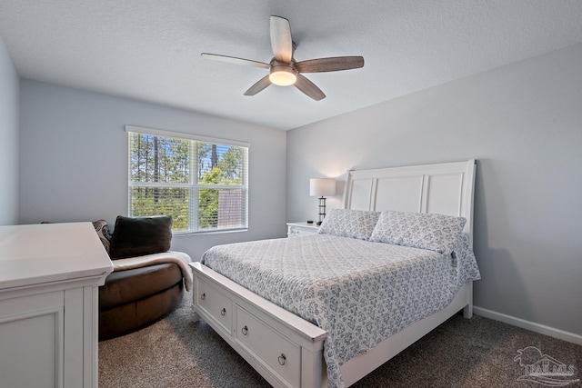 10985 Blacktail Loop, Pensacola, FL 32526 - bedroom featuring dark colored carpet, ceiling fan, baseboards, and a textured ceiling