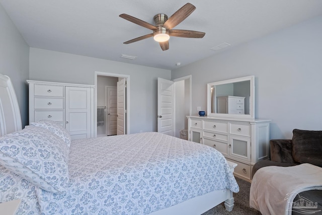10985 Blacktail Loop, Pensacola, FL 32526 - carpeted bedroom featuring ceiling fan and ensuite bathroom