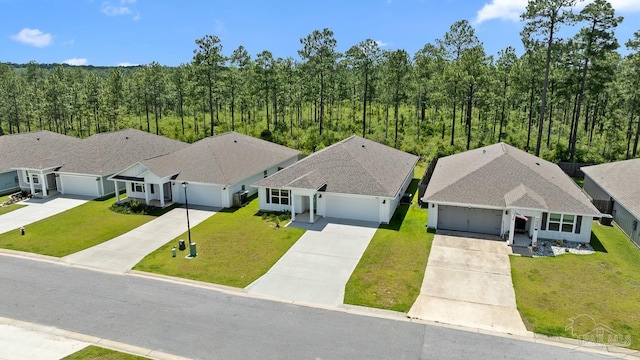 10985 Blacktail Loop, Pensacola, FL 32526 - view from above of property with a heavily wooded area