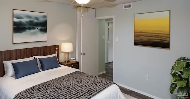 bedroom featuring ceiling fan and hardwood / wood-style flooring