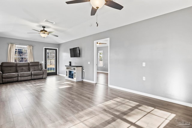 unfurnished living room with hardwood / wood-style floors