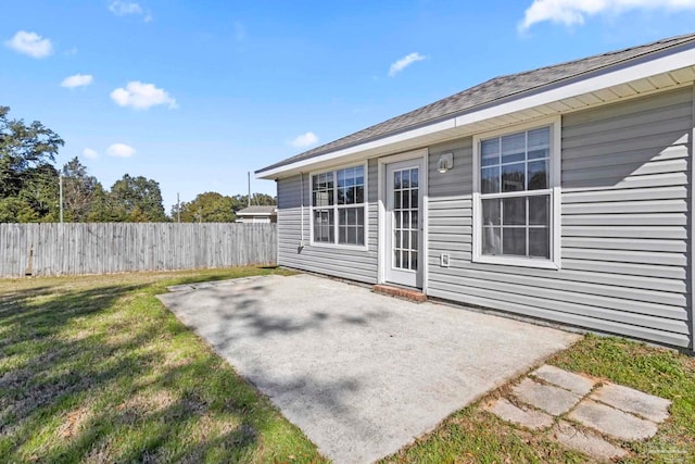 exterior space featuring a yard and a patio