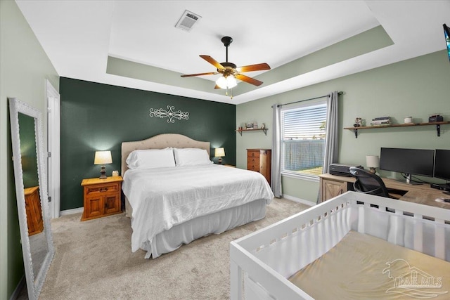 3966 Willow Glen Dr, Pace, FL 32571 - bedroom featuring a raised ceiling, carpet flooring, baseboards, and visible vents