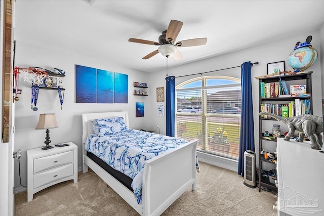 3966 Willow Glen Dr, Pace, FL 32571 - carpeted bedroom with baseboards and a ceiling fan