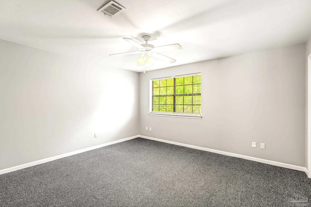 5791 Coronada Blvd Apt 2, Pensacola, FL 32507 - empty room with baseboards, ceiling fan, dark carpet, and visible vents