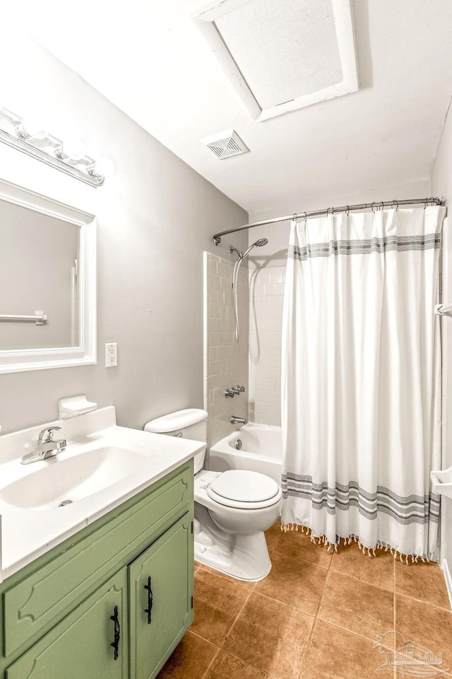5791 Coronada Blvd Apt 2, Pensacola, FL 32507 - bathroom with vanity, tile patterned flooring, visible vents, shower / bath combo with shower curtain, and toilet