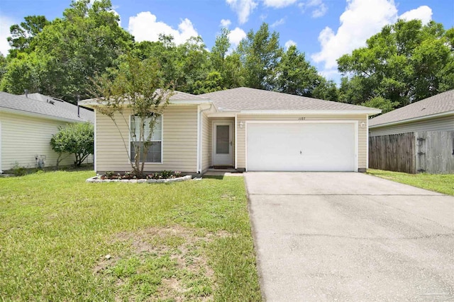 1107 Simpson St, Pensacola, FL 32526 - ranch-style house with a garage and driveway