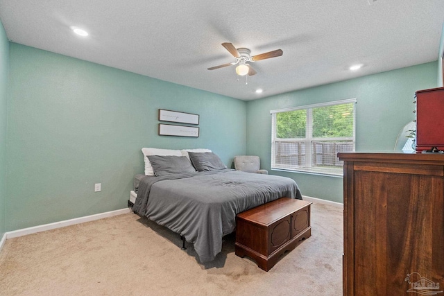 bedroom with recessed lighting, a ceiling fan, light colored carpet, and baseboards