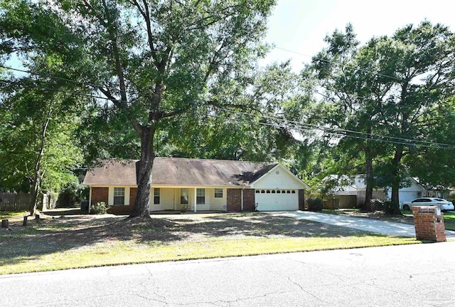 ranch-style home featuring a garage