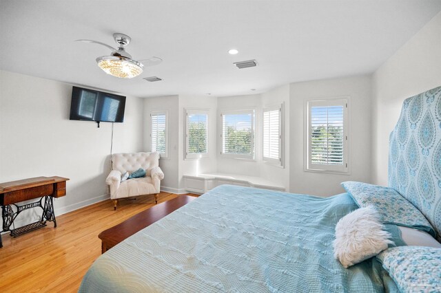 bedroom with wood-type flooring