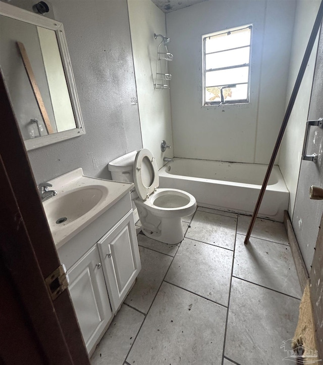 full bathroom with tile patterned flooring, vanity, toilet, and washtub / shower combination