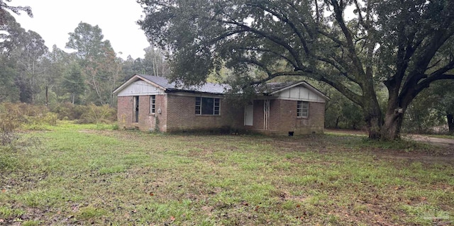 exterior space with a front lawn