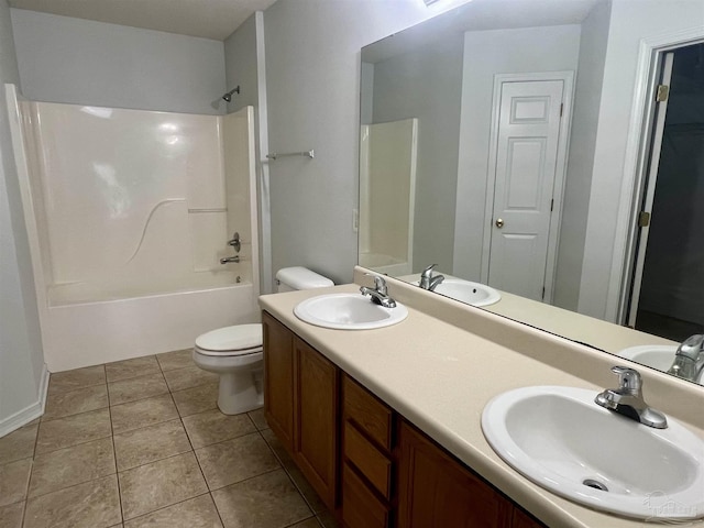 5538 Rowell Rd, Milton, FL 32583 - full bath featuring toilet,  shower combination, double vanity, and tile patterned floors