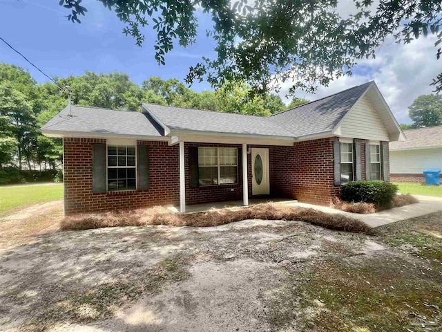 5538 Rowell Rd, Milton, FL 32583 - single story home featuring brick siding and a shingled roof