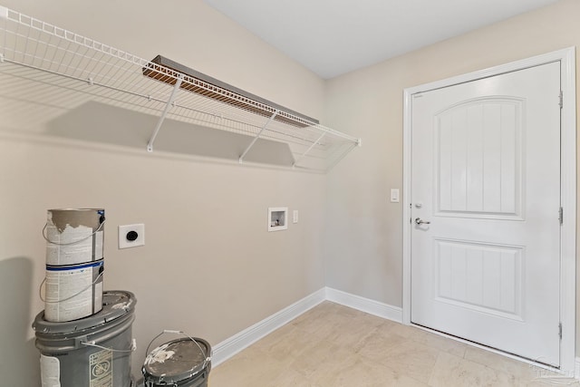 washroom with hookup for an electric dryer and washer hookup