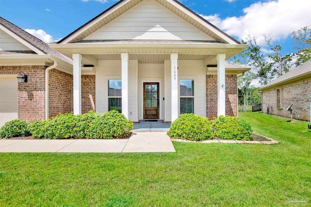 exterior space featuring a front yard and covered porch