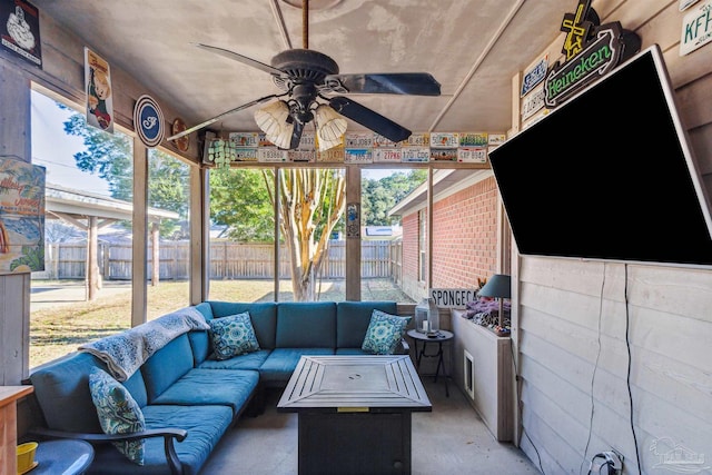 sunroom / solarium with ceiling fan