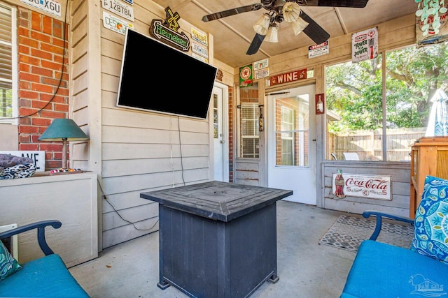 view of patio with ceiling fan