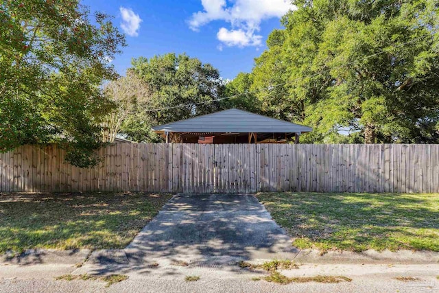 view of yard with a carport