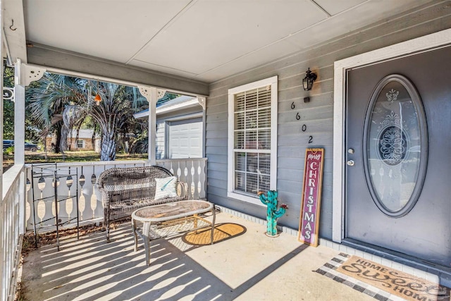 property entrance featuring covered porch