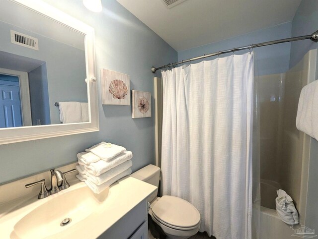 14391 Perdido Key Dr Unit D, Pensacola, FL 32507 - full bathroom featuring vanity, toilet, and shower / bathtub combination with curtain