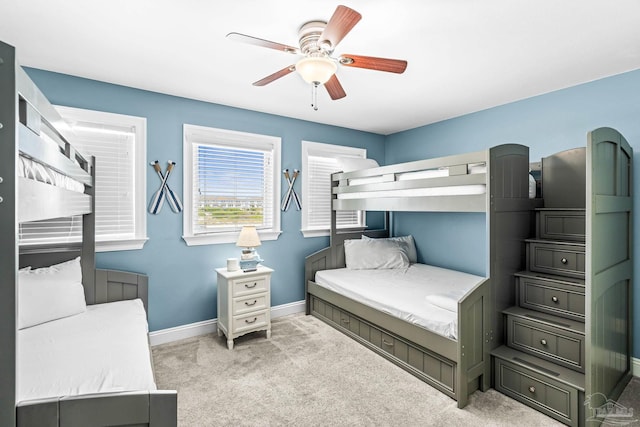 14391 Perdido Key Dr Unit D, Pensacola, FL 32507 - bedroom featuring baseboards, light carpet, and ceiling fan