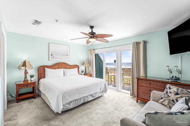 14391 Perdido Key Dr Unit D, Pensacola, FL 32507 - bedroom with access to exterior, light carpet, and a ceiling fan