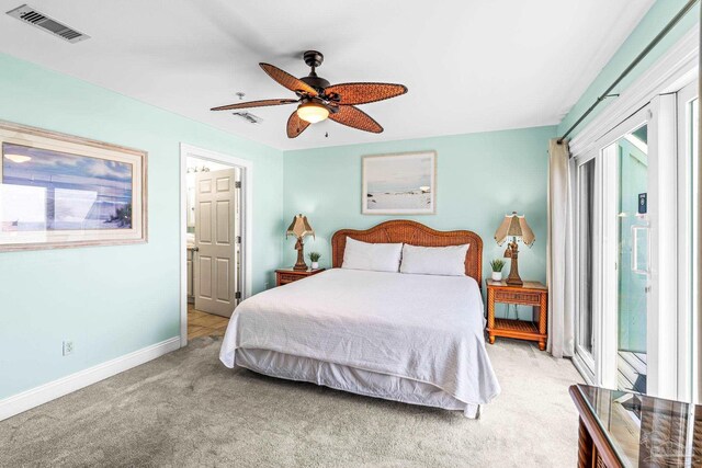 14391 Perdido Key Dr Unit D, Pensacola, FL 32507 - bedroom with light carpet, baseboards, ceiling fan, and access to outside