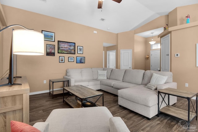 living room featuring visible vents, baseboards, lofted ceiling, wood finished floors, and a ceiling fan