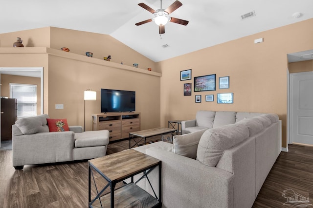 living room with visible vents, dark wood-style floors, a ceiling fan, and vaulted ceiling