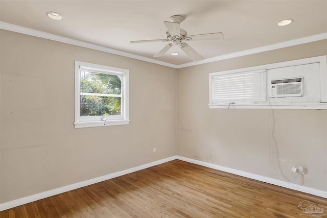 1001 E Bobe St, Pensacola, FL 32503 - empty room with crown molding, baseboards, a ceiling fan, and wood finished floors