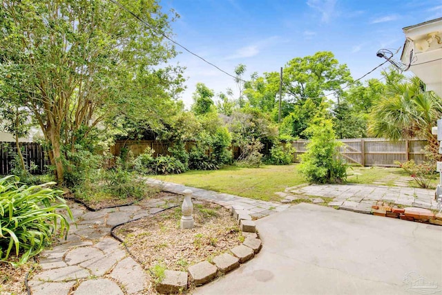 1001 E Bobe St, Pensacola, FL 32503 - view of yard featuring a fenced backyard and a patio