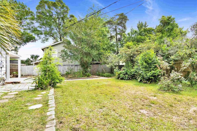 1001 E Bobe St, Pensacola, FL 32503 - view of yard with a fenced backyard and a patio area