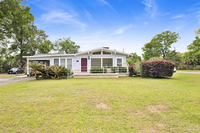 1001 E Bobe St, Pensacola, FL 32503 - view of front of property featuring driveway and a front yard
