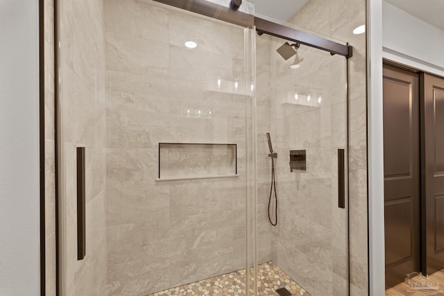 bathroom with a stall shower