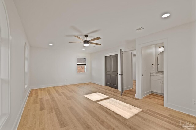 unfurnished bedroom with visible vents, light wood finished floors, and recessed lighting