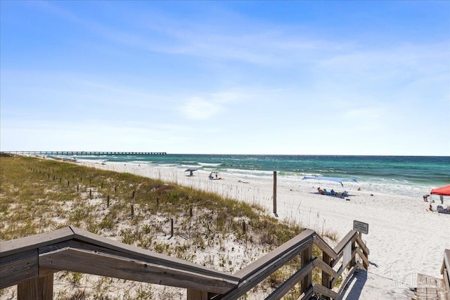 property view of water featuring a beach view