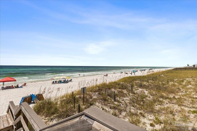 property view of water featuring a beach view