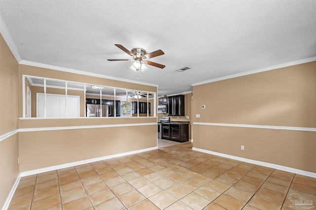 unfurnished living room featuring ceiling fan, light tile patterned floors, a textured ceiling, and ornamental molding