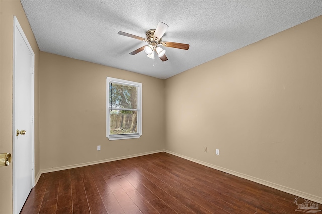 unfurnished room featuring ceiling fan, a textured ceiling, and dark wood-type flooring