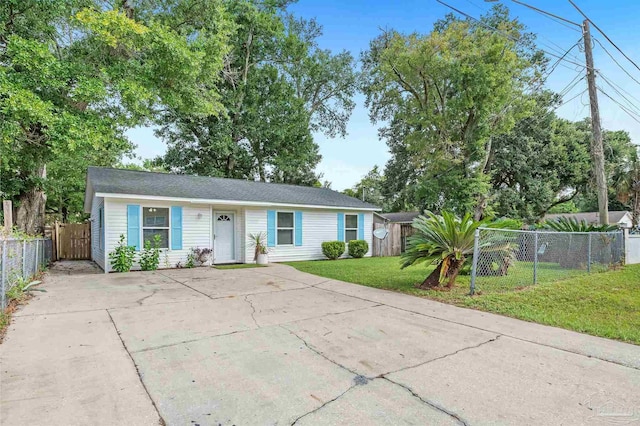 ranch-style home with a front lawn