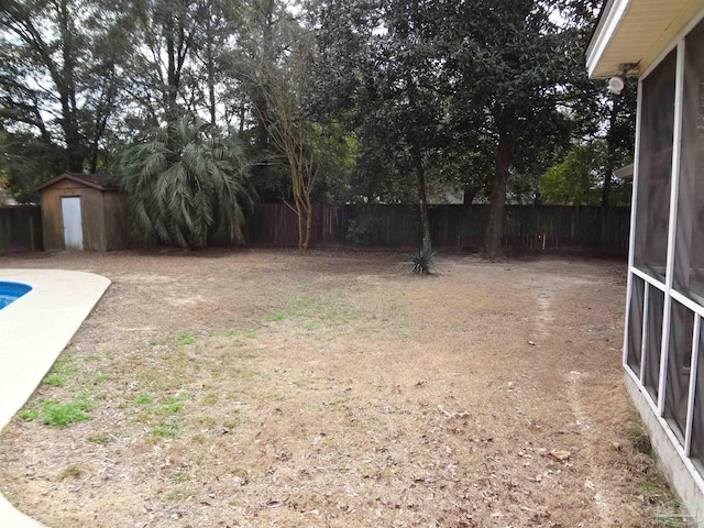 view of yard featuring a storage shed