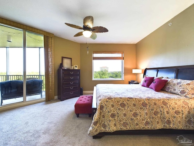 carpeted bedroom with ceiling fan, baseboards, and access to exterior