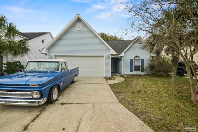 ranch-style home featuring a garage and a front yard