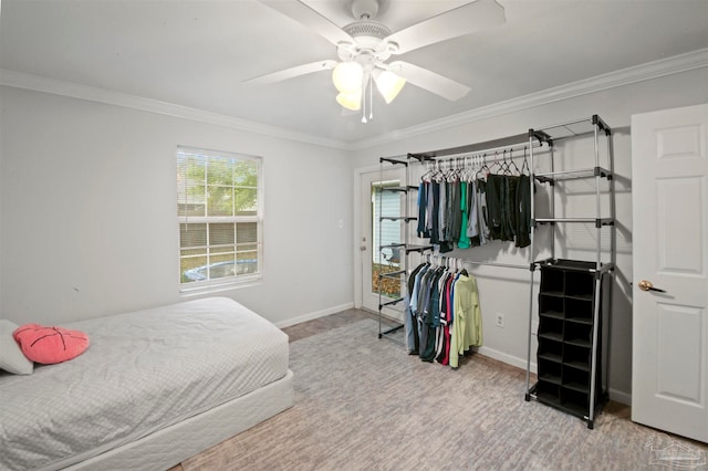 bedroom with ornamental molding and ceiling fan