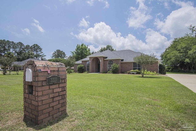 3221 Cobblestone Dr, Pace, FL 32571 - view of front of house with a front lawn