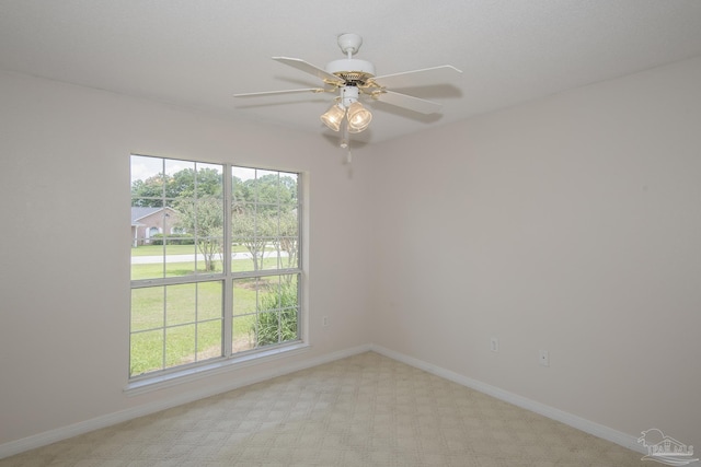 3221 Cobblestone Dr, Pace, FL 32571 - empty room with light carpet, healthy amount of natural light, and baseboards