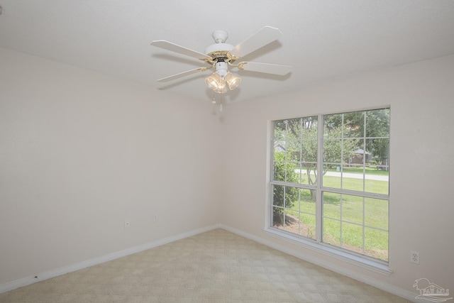 3221 Cobblestone Dr, Pace, FL 32571 - spare room with healthy amount of natural light, light carpet, baseboards, and a ceiling fan
