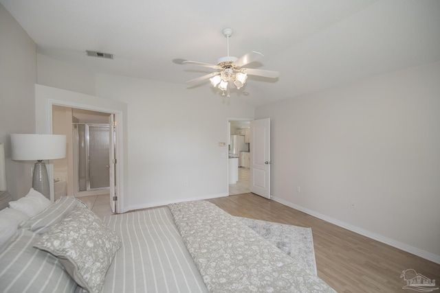 3221 Cobblestone Dr, Pace, FL 32571 - bedroom with light wood finished floors, baseboards, and ceiling fan